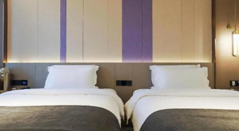 Bed in Lavande Hotel Shanghai Jing'an Shibei Gaoxin