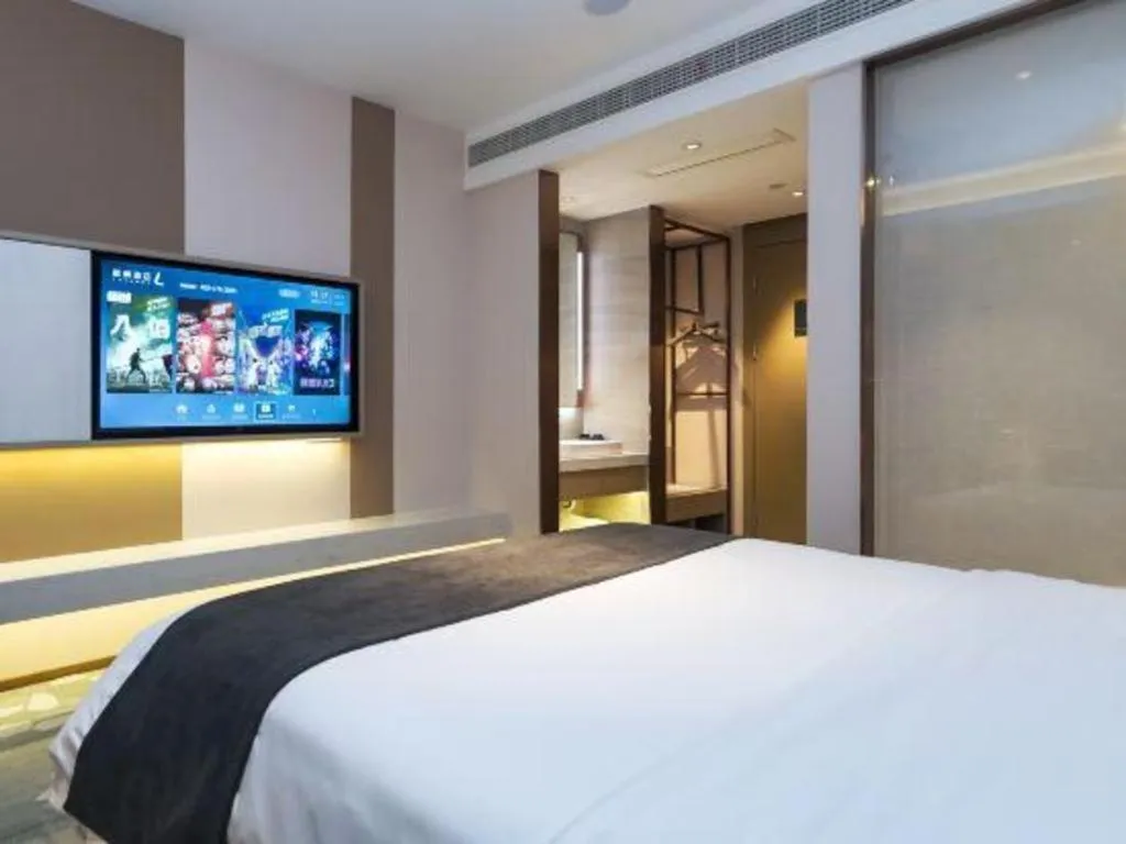 Bed in Lavande Hotel Shanghai Jing'an Shibei Gaoxin