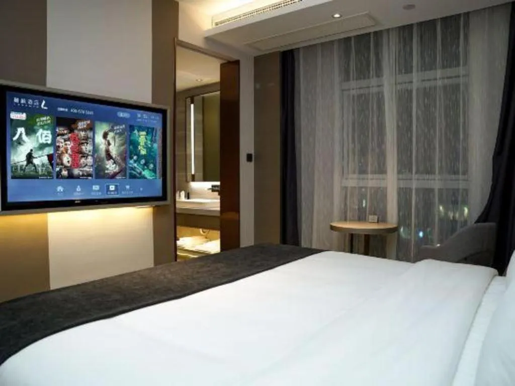 Bed in Lavande Hotel Shanghai Jing'an Shibei Gaoxin