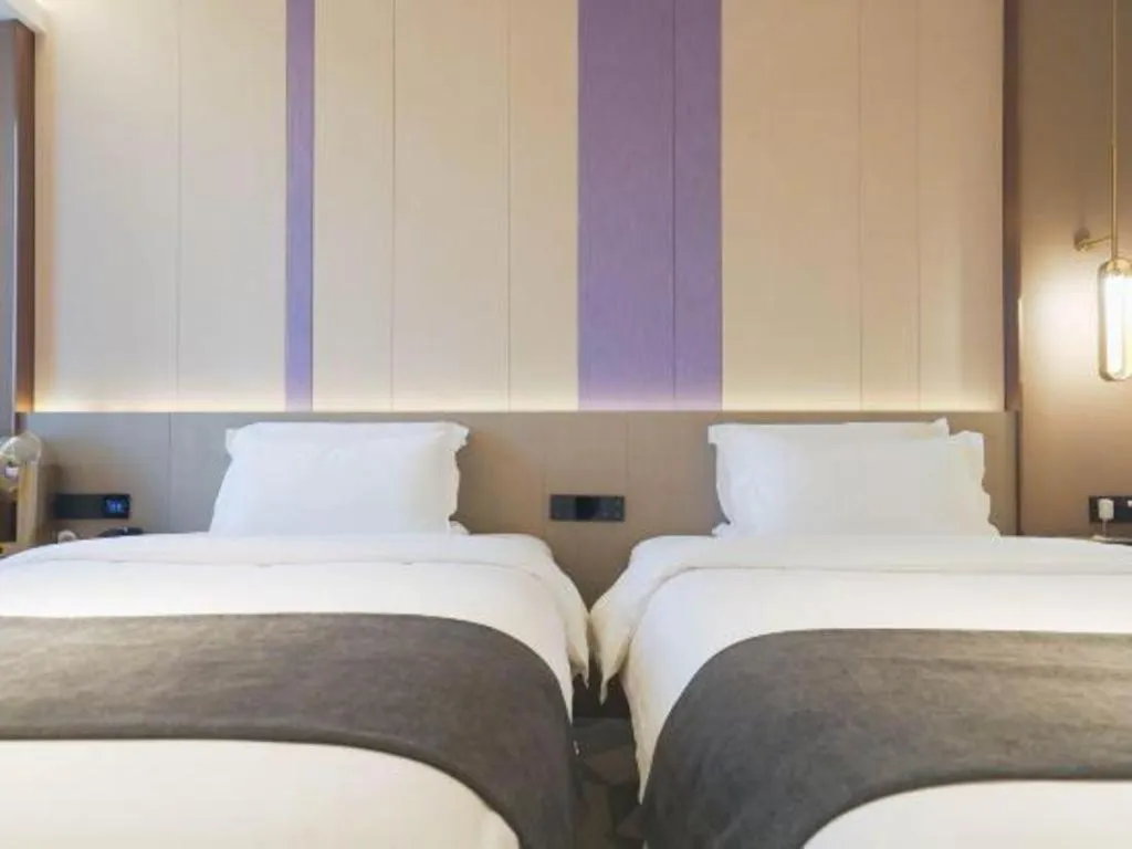 Bed in Lavande Hotel Shanghai Jing'an Shibei Gaoxin