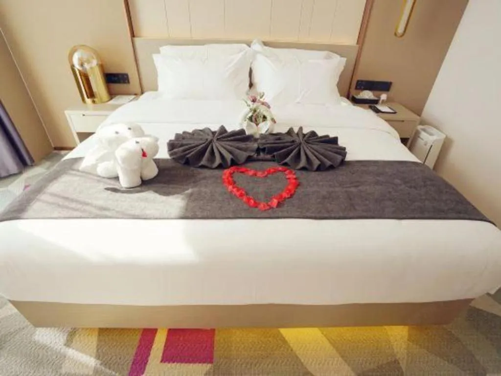 Bed in Lavande Hotel Shanghai Jing'an Shibei Gaoxin