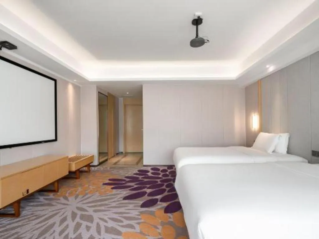 Bed in Lavande Hotel Maoming High-speed Railway Station Xinfu Road