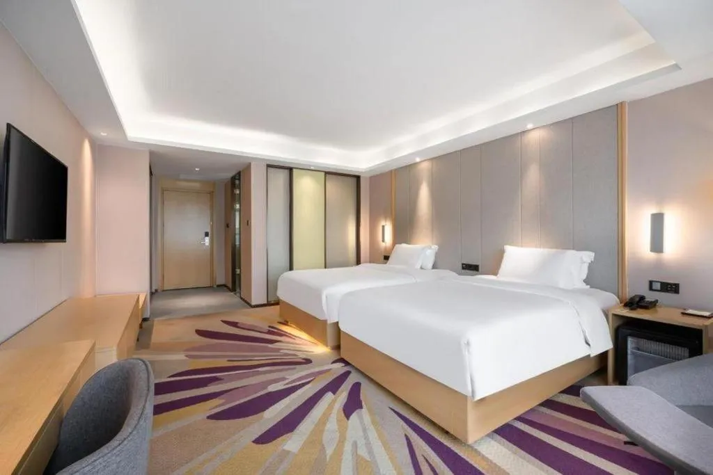 Bed in Lavande Hotel Maoming High-speed Railway Station Xinfu Road