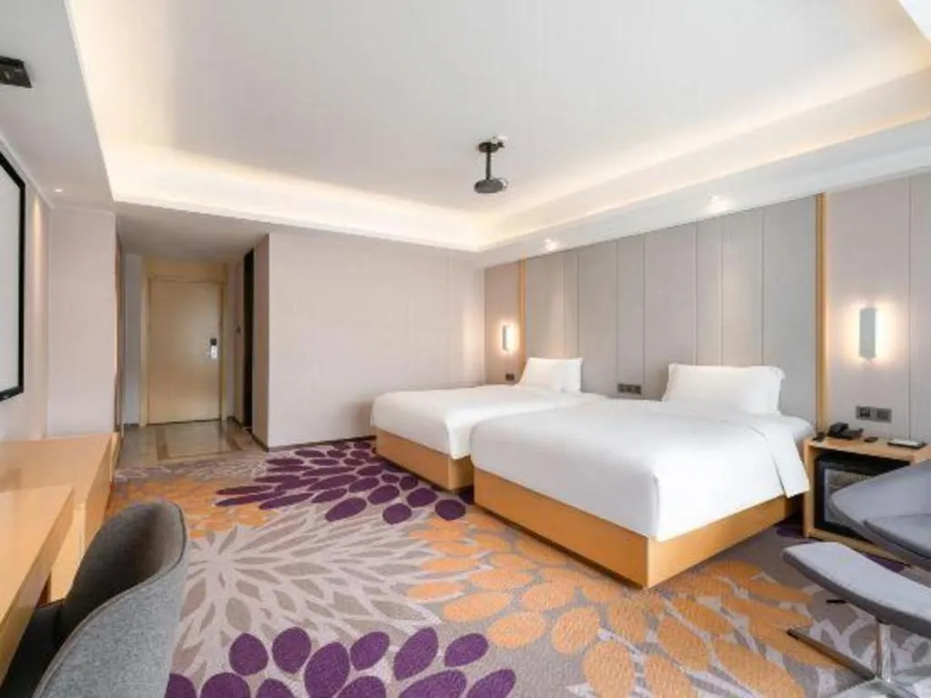 Bed in Lavande Hotel Maoming High-speed Railway Station Xinfu Road