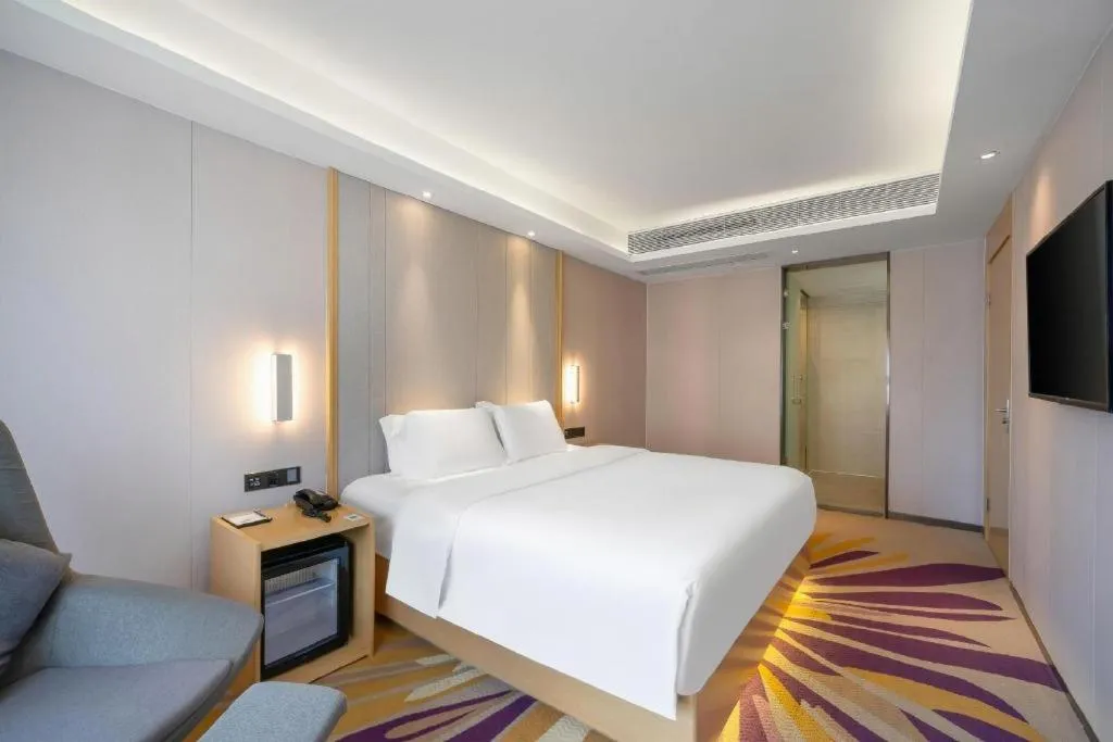 Bed in Lavande Hotel Maoming High-speed Railway Station Xinfu Road