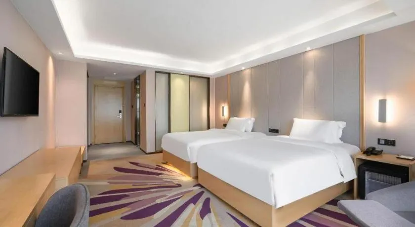 Bed in Lavande Hotel Maoming High-speed Railway Station Xinfu Road