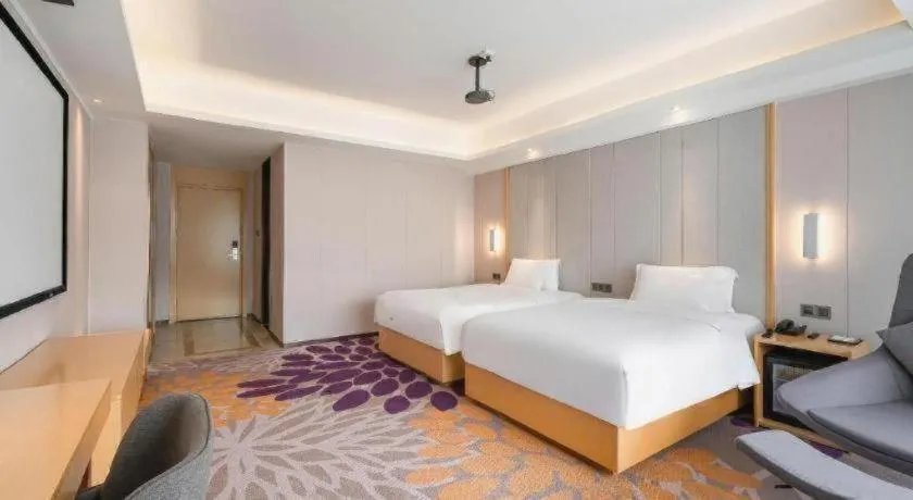 Bed in Lavande Hotel Maoming High-speed Railway Station Xinfu Road