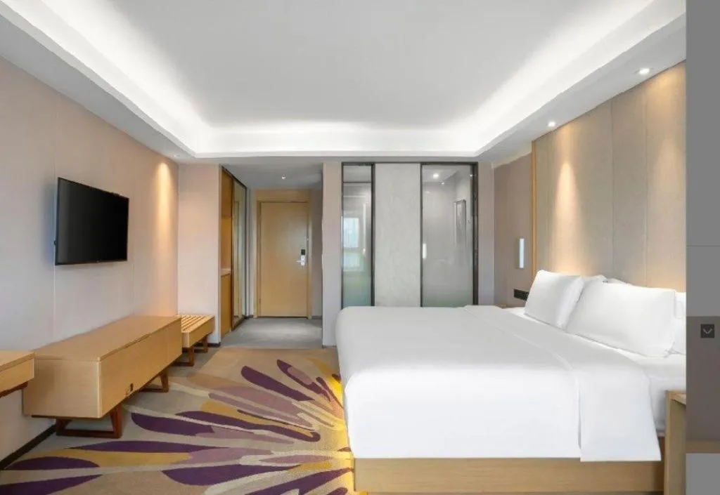 Bed in Lavande Hotel Maoming High-speed Railway Station Xinfu Road