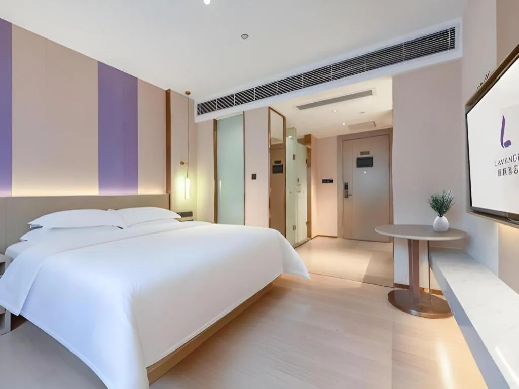 Bed in Lavande Hotel Zhongshan Shiqi Daxinxinduhui North Zhongshan Station