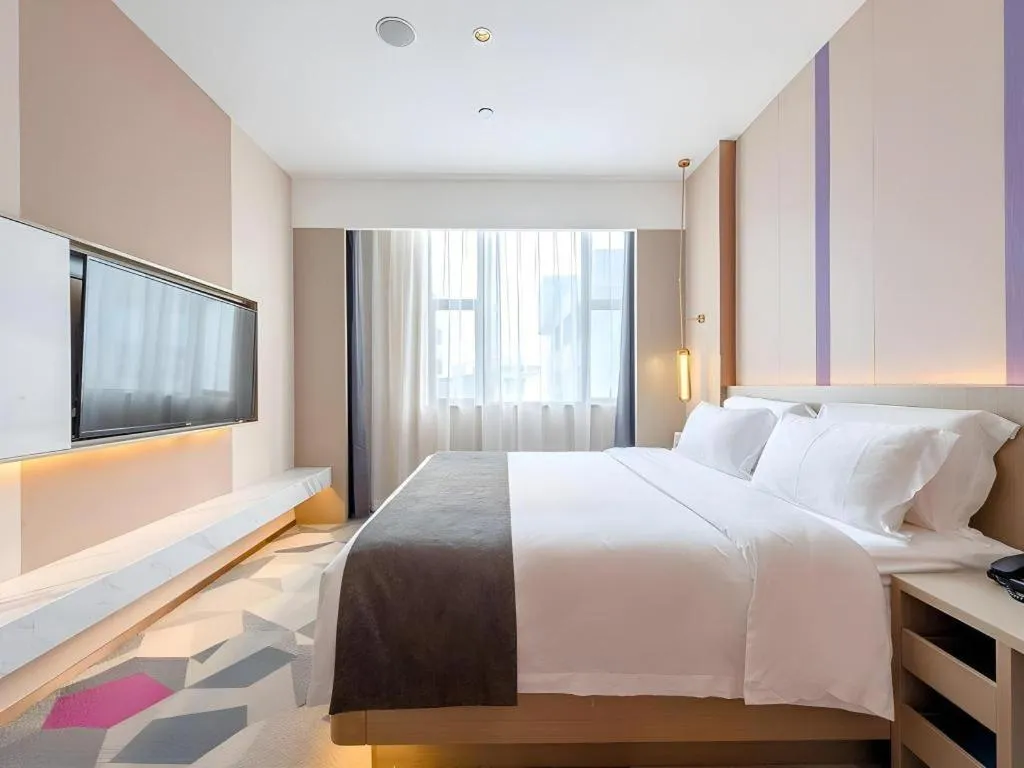 Bed in Lavande Hotel Zhongshan Shiqi Daxinxinduhui North Zhongshan Station