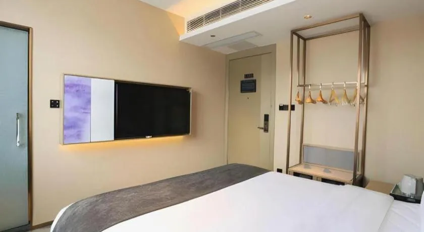 Bed in Lavande Hotel Zhongshan Shiqi Daxinxinduhui North Zhongshan Station