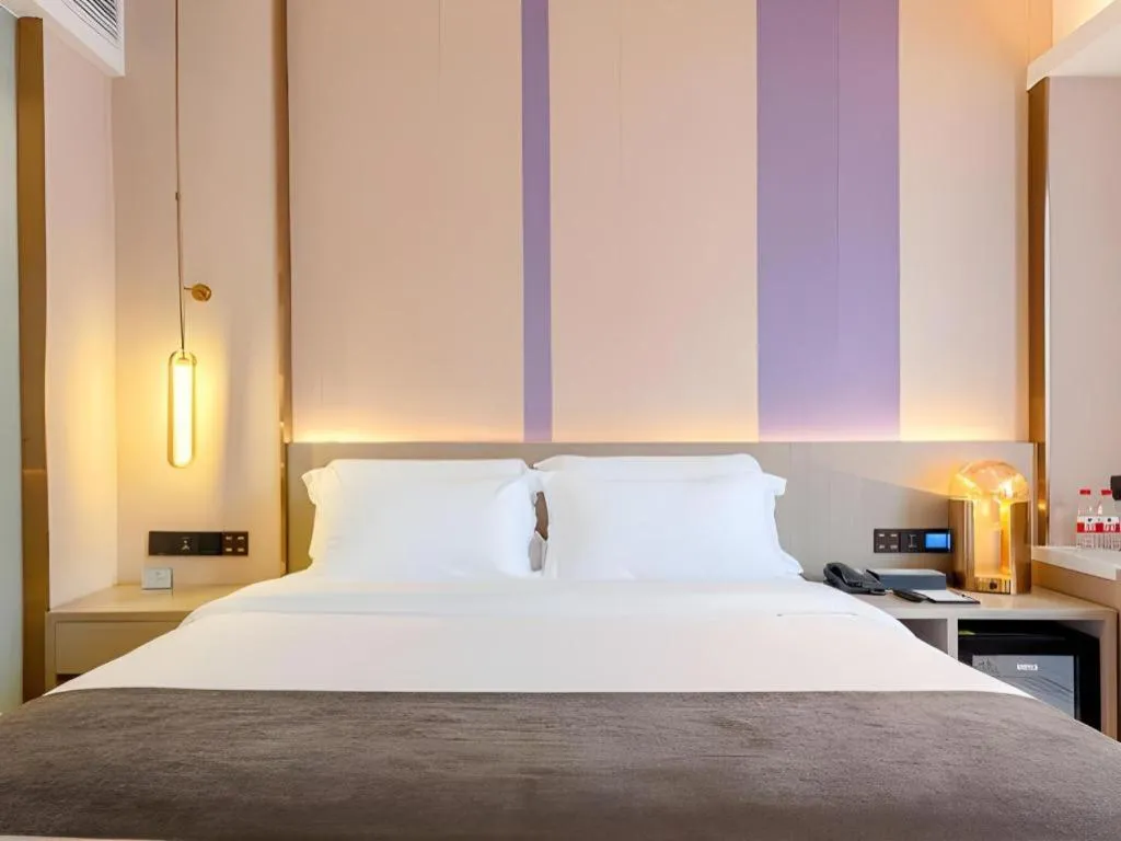 Bed in Lavande Hotel Zhongshan Shiqi Daxinxinduhui North Zhongshan Station