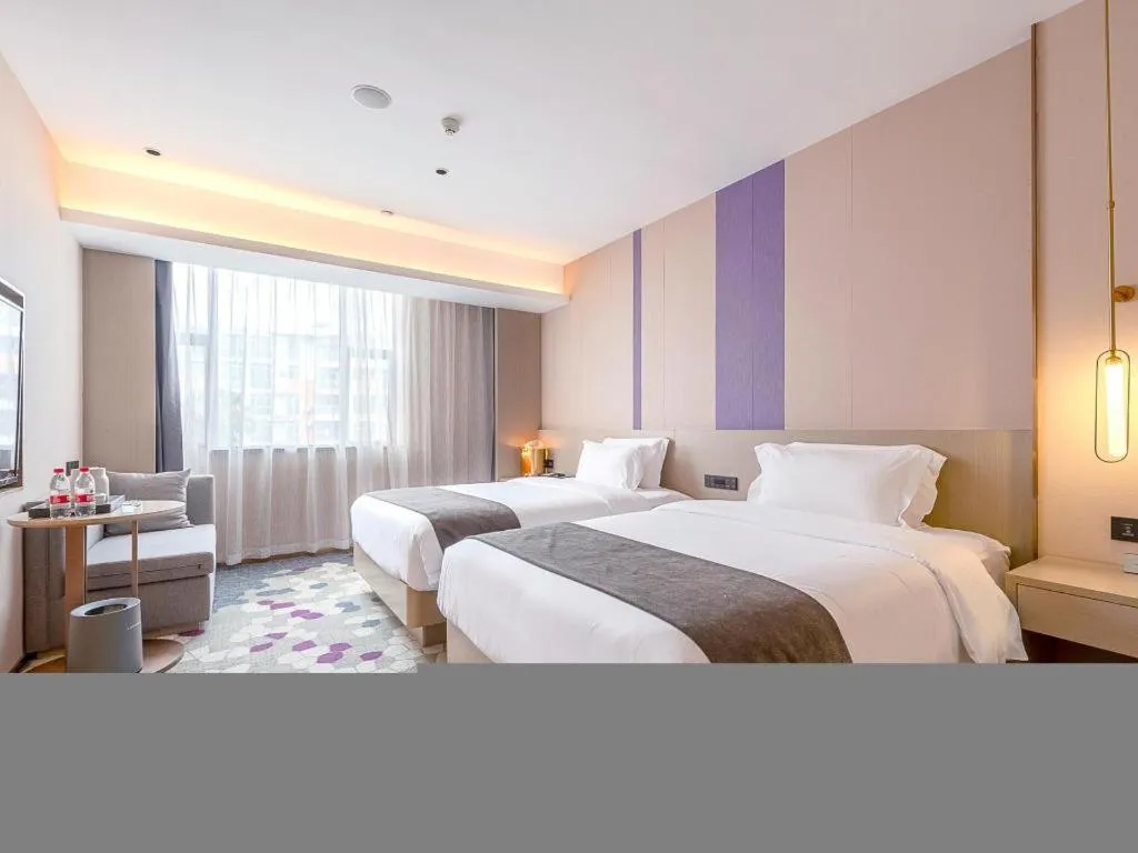 Bed in Lavande Hotel Zhongshan Shiqi Daxinxinduhui North Zhongshan Station