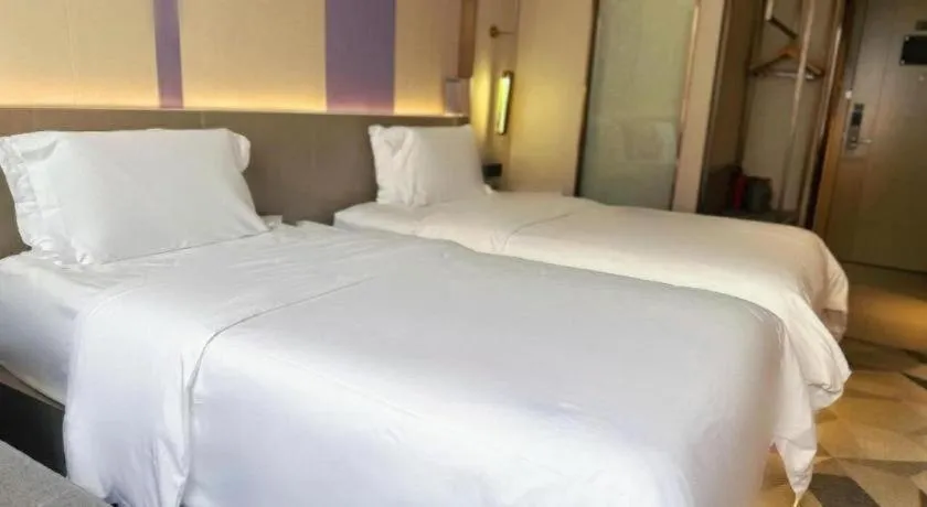 Bed in Lavande Hotel Zhongshan Shiqi Daxinxinduhui North Zhongshan Station