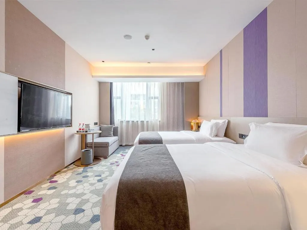 Bed in Lavande Hotel Zhongshan Shiqi Daxinxinduhui North Zhongshan Station