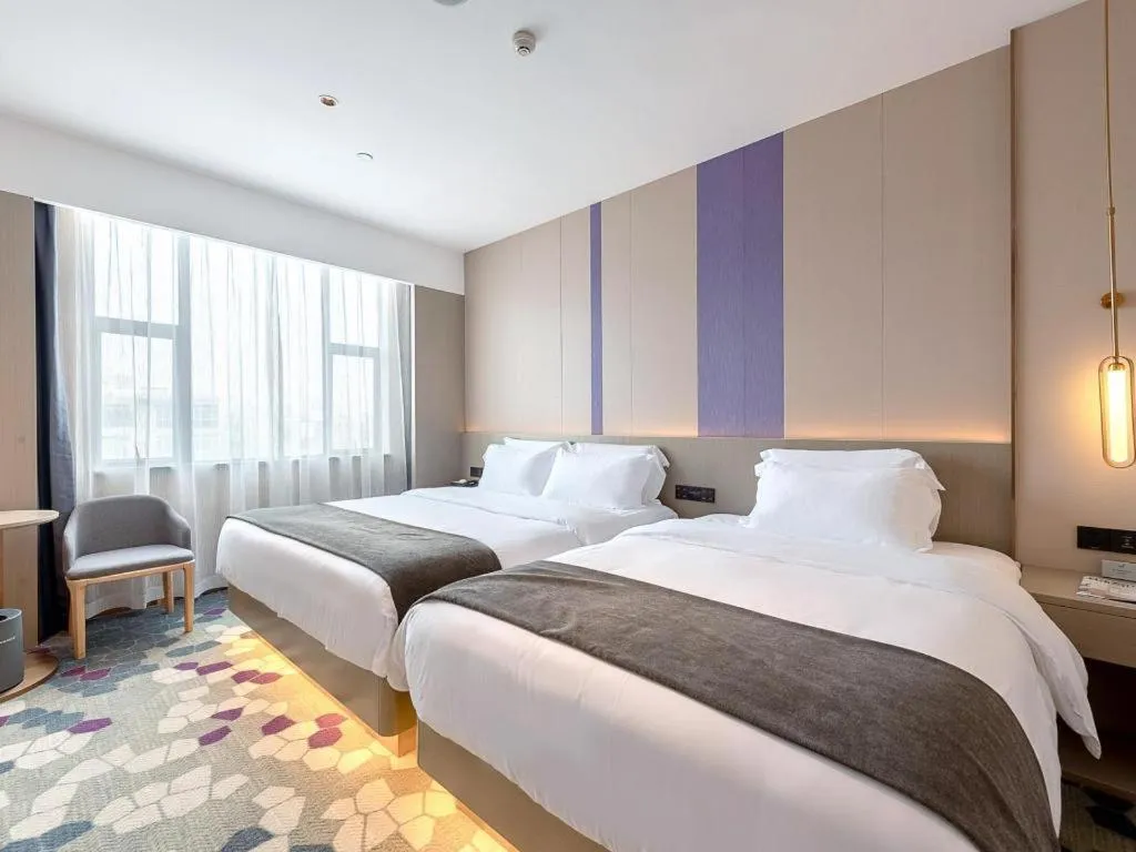 Bed in Lavande Hotel Zhongshan Shiqi Daxinxinduhui North Zhongshan Station