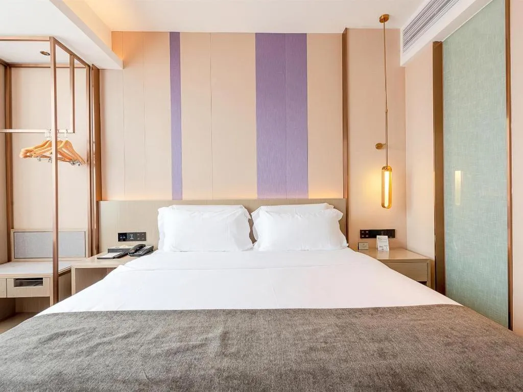 Bed in Lavande Hotel Zhongshan Shiqi Daxinxinduhui North Zhongshan Station