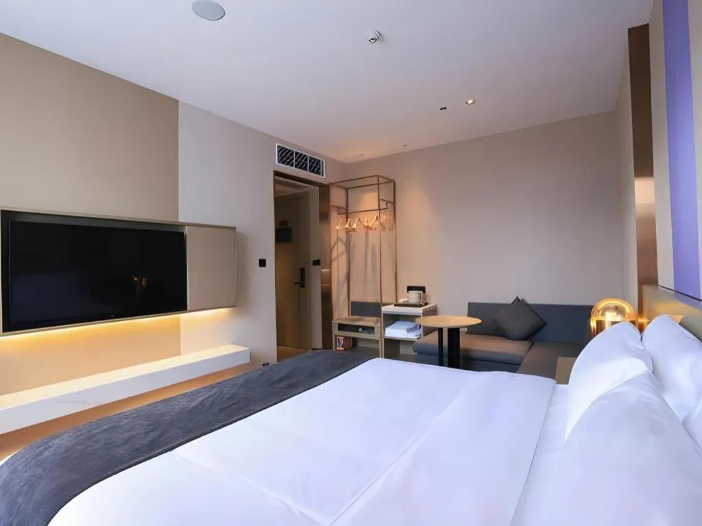 Bed in Lavande Hotel Zhongshan Shiqi Daxinxinduhui North Zhongshan Station