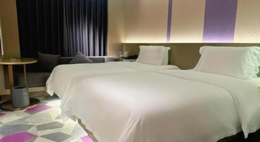 Bed in Lavande Hotel Zhongshan Shiqi Daxinxinduhui North Zhongshan Station