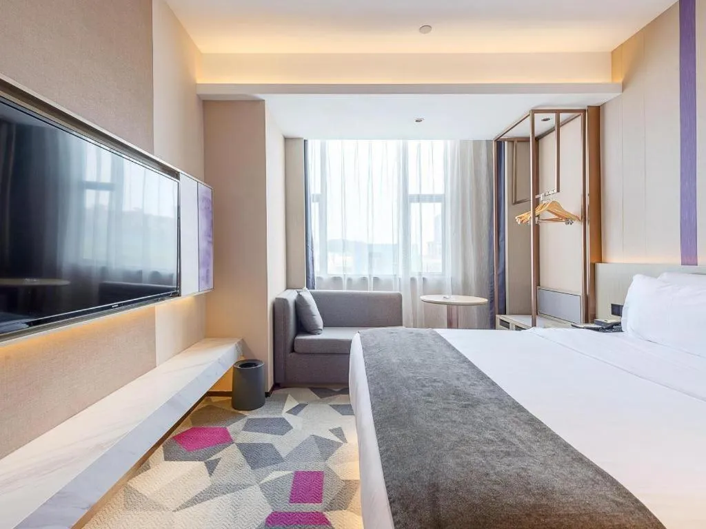 Bed in Lavande Hotel Zhongshan Shiqi Daxinxinduhui North Zhongshan Station