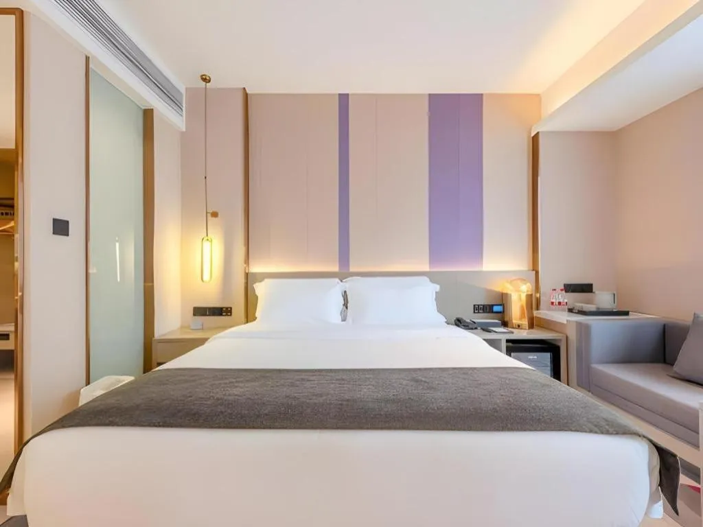 Bed in Lavande Hotel Zhongshan Shiqi Daxinxinduhui North Zhongshan Station