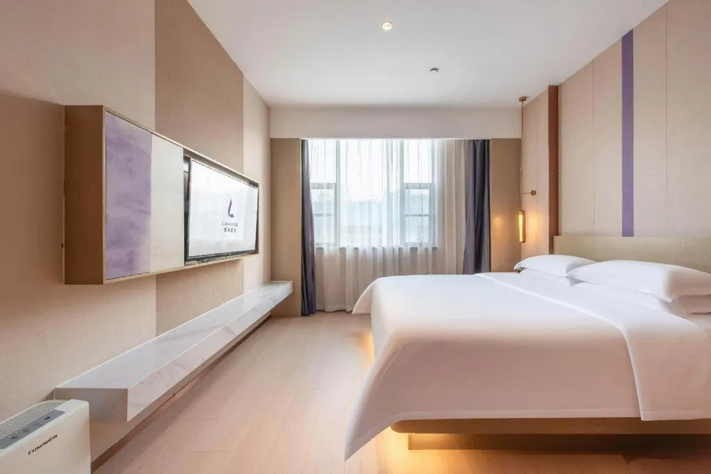 Bed in Lavande Hotel Zhongshan Shiqi Daxinxinduhui North Zhongshan Station