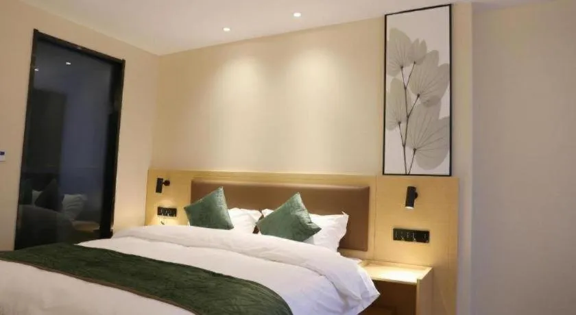 Bed in Green Tree Inn Express Chizhou Gymnasium