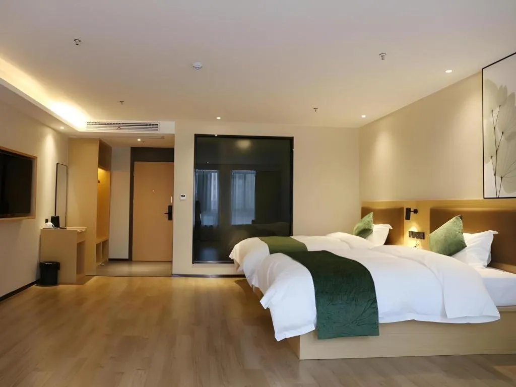 Bed in Green Tree Inn Express Chizhou Gymnasium