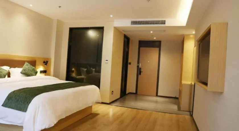 Bed in Green Tree Inn Express Chizhou Gymnasium