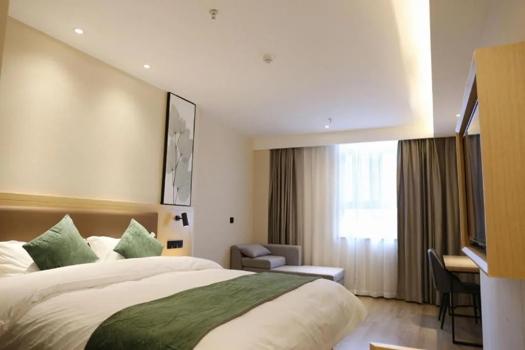 Bed in Green Tree Inn Express Chizhou Gymnasium