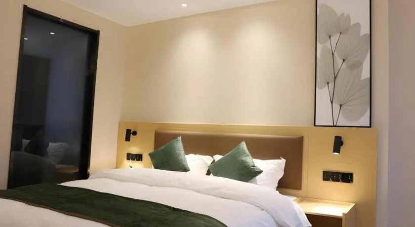 Bed in Green Tree Inn Express Chizhou Gymnasium