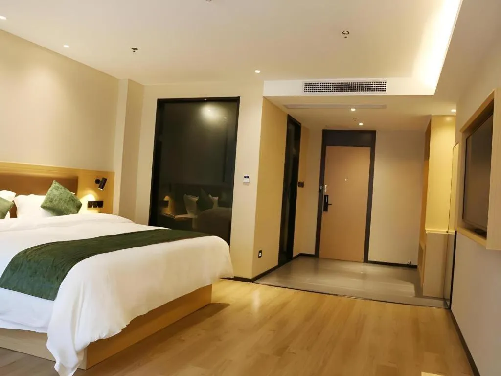 Bed in Green Tree Inn Express Chizhou Gymnasium