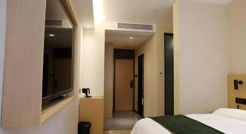 Bed in Green Tree Inn Express Chizhou Gymnasium