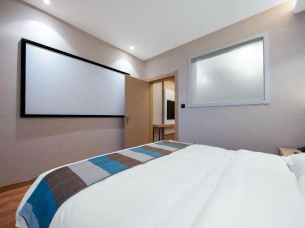 Bed in VX Hotel Beijing Daxing Wufutang Metro Station Zhongke Dianshanggu