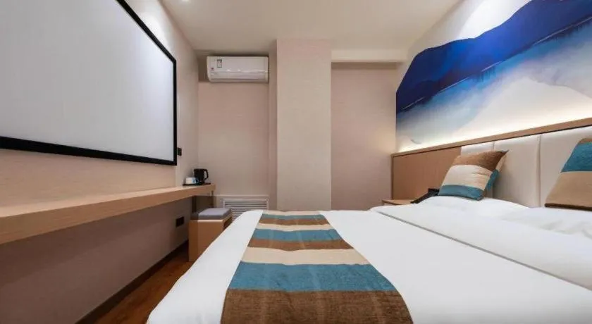 Bed in VX Hotel Beijing Daxing Wufutang Metro Station Zhongke Dianshanggu