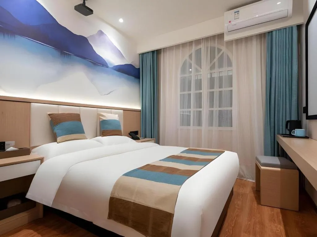 Bed in VX Hotel Beijing Daxing Wufutang Metro Station Zhongke Dianshanggu