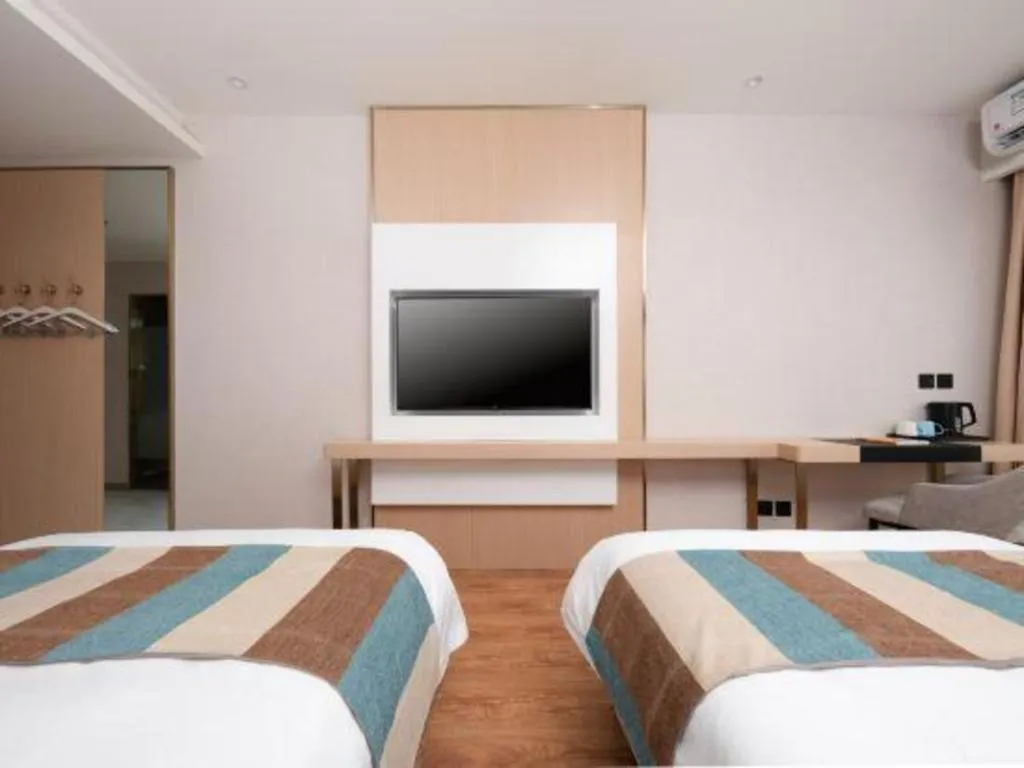 Bed in VX Hotel Beijing Daxing Wufutang Metro Station Zhongke Dianshanggu