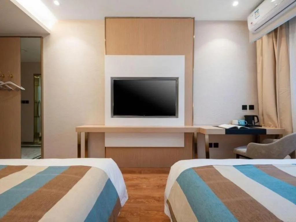 Bed in VX Hotel Beijing Daxing Wufutang Metro Station Zhongke Dianshanggu