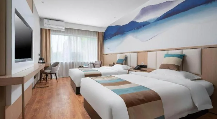 Bed in VX Hotel Beijing Daxing Wufutang Metro Station Zhongke Dianshanggu