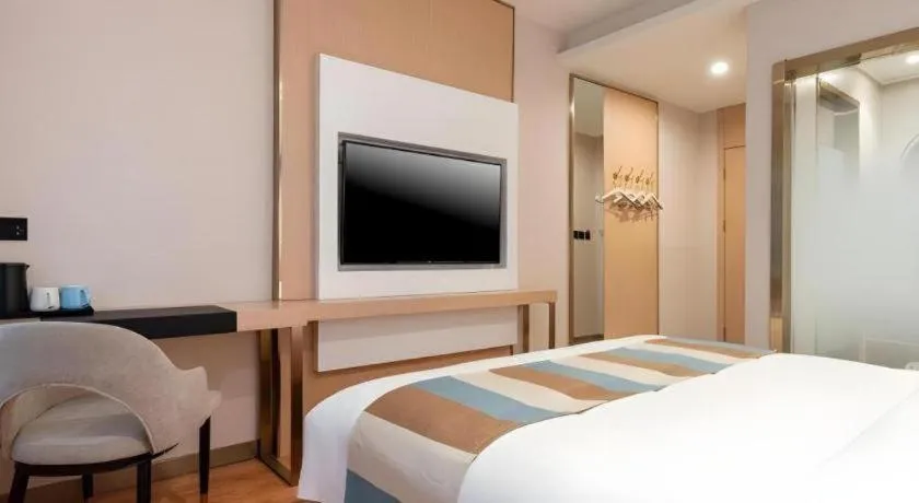 Bed in VX Hotel Beijing Daxing Wufutang Metro Station Zhongke Dianshanggu