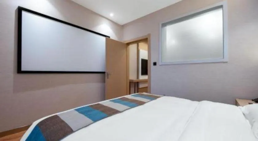 Bed in VX Hotel Beijing Daxing Wufutang Metro Station Zhongke Dianshanggu