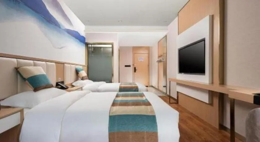 Bed in VX Hotel Beijing Daxing Wufutang Metro Station Zhongke Dianshanggu