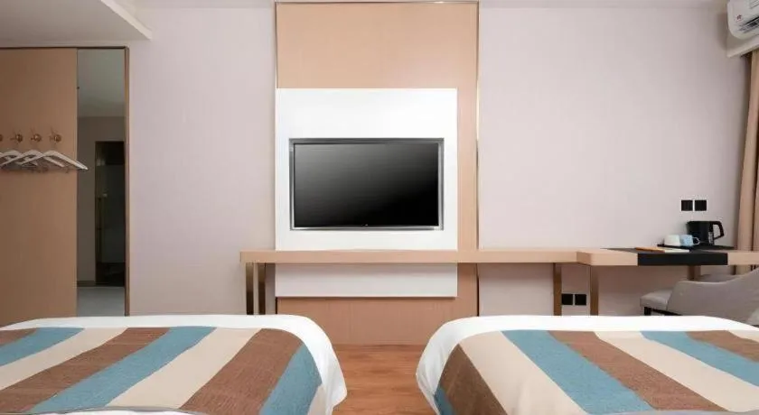 Bed in VX Hotel Beijing Daxing Wufutang Metro Station Zhongke Dianshanggu