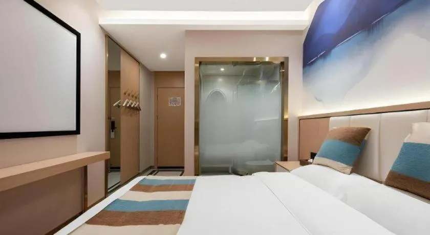 Bed in VX Hotel Beijing Daxing Wufutang Metro Station Zhongke Dianshanggu