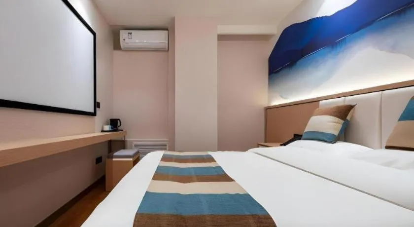 Bed in VX Hotel Beijing Daxing Wufutang Metro Station Zhongke Dianshanggu