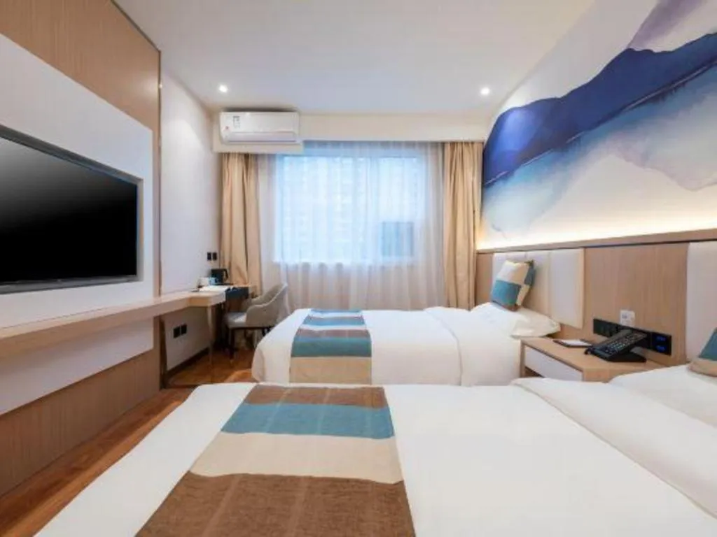 Bed in VX Hotel Beijing Daxing Wufutang Metro Station Zhongke Dianshanggu