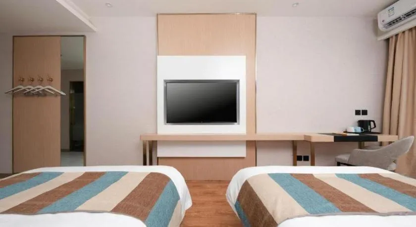 Bed in VX Hotel Beijing Daxing Wufutang Metro Station Zhongke Dianshanggu