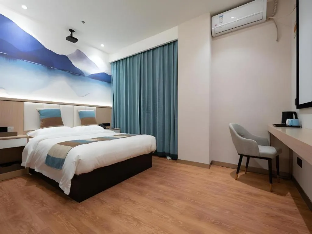 Bed in VX Hotel Beijing Daxing Wufutang Metro Station Zhongke Dianshanggu