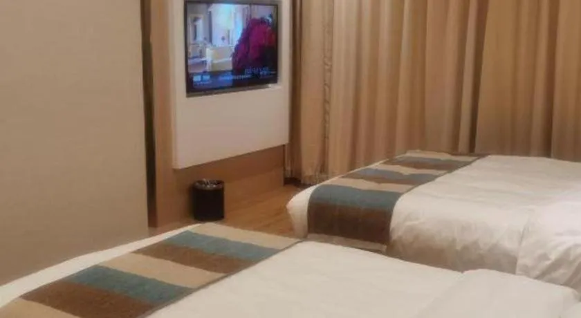 Bed in VX Hotel Beijing Daxing Wufutang Metro Station Zhongke Dianshanggu