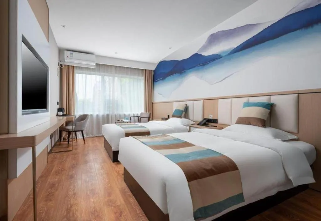 Bed in VX Hotel Beijing Daxing Wufutang Metro Station Zhongke Dianshanggu